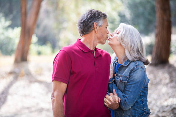 istock Senior Couple walking in Nature 1146961311