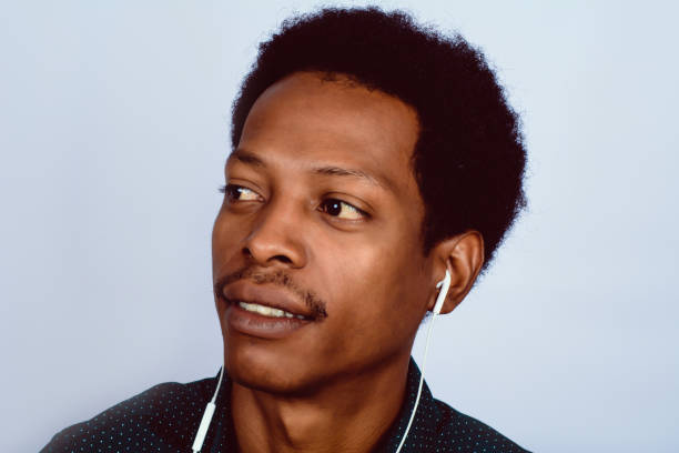 istock Afro American man listening music. 1146962405