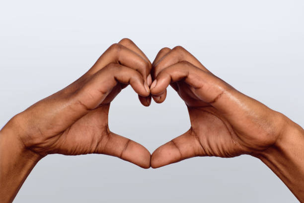 istock Afro American hand make heart shape. 1146962891