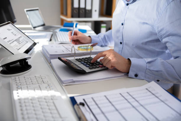 istock Businessperson Calculating Invoice 1146963898