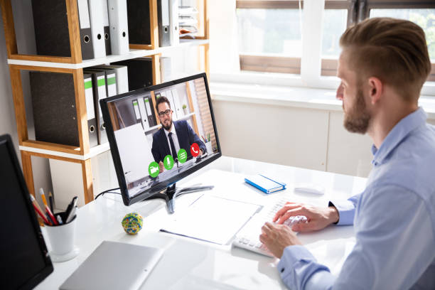 istock Businessman on a video or conference call on his computer 1146964019