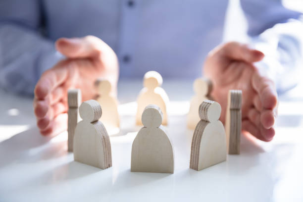 istock Person Protecting Paper Cut Out Figure 1146964351