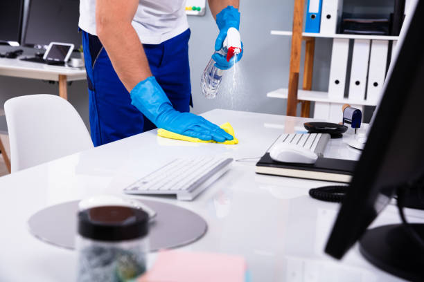 Janitor cleaning white desk in office Janitor cleaning white desk in modern office clean stock pictures, royalty-free photos & images