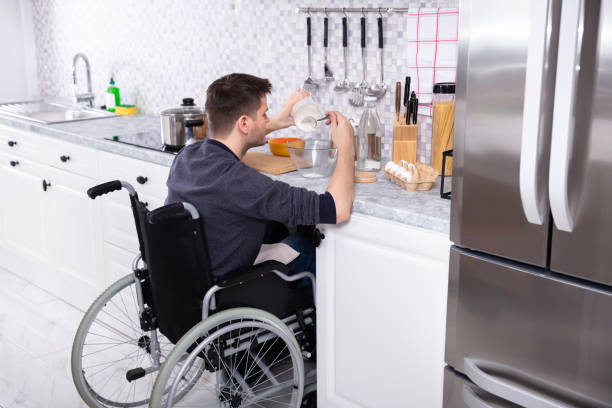 istock Disabled Man Preparing Food In Kitchen 1146966124