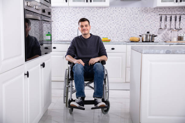 istock Happy Handicapped Man In Kitchen 1146966653