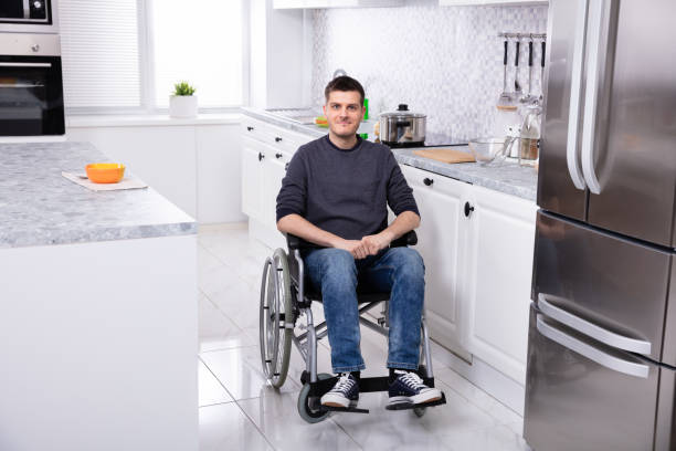 istock Happy Handicapped Man In Kitchen 1146966657