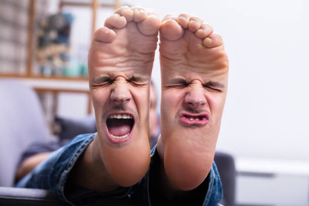 Feet With Painful Facial Expression Stock Photo - Download Image Now -  Foot, Pain, Humor - iStock