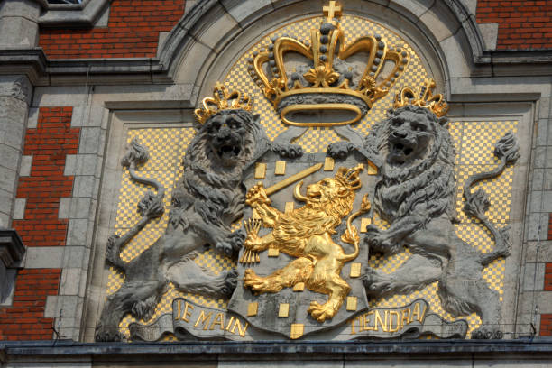 Lions on Amsterdam Central Train Station at sunset, the Netherlands