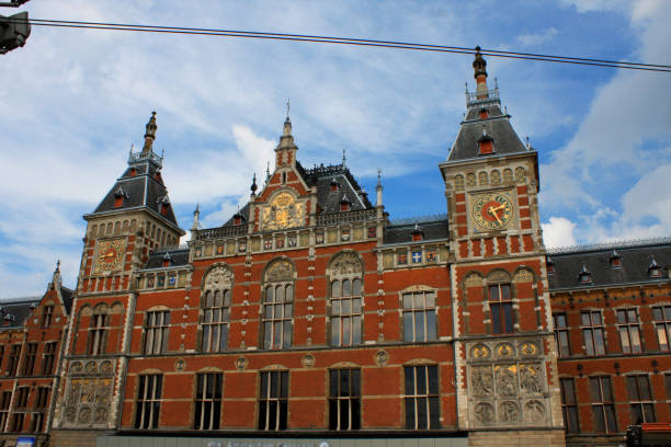 istock Amsterdam Central Train Station at sunset, the Netherlands 1146968021