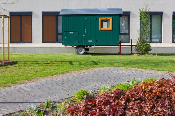 istock construction trailer in front of modern office building 1146968114