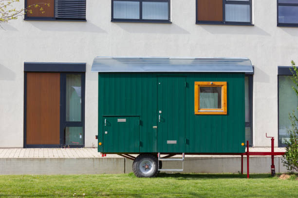 istock construction trailer in front of modern office building 1146968129