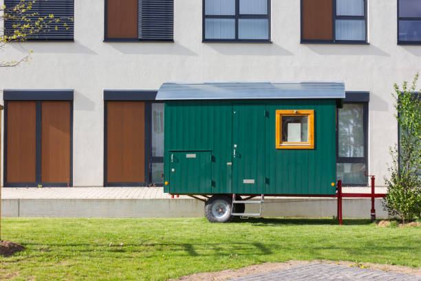 istock construction trailer in front of modern office building 1146968162