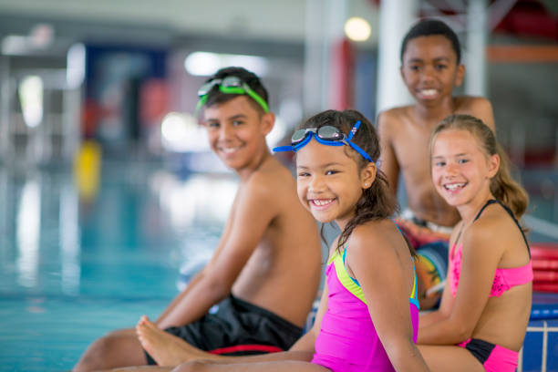 istock Kids at indoor pool 1146968815