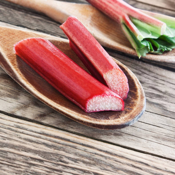 istock Rhubarb and wooden cooking spoons 1146969842