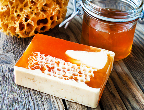 Skin care milk and honey soap close up