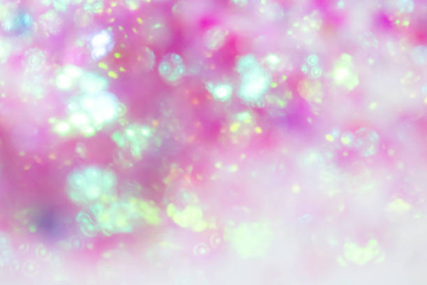istock Pink Sparkling Glitter on White Background Bokeh Abstract Close Up 1146971935