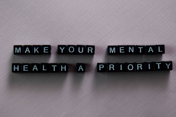 Make your mental health a priority on wooden blocks. Motivation and inspiration concept Make your mental health a priority on wooden blocks. Motivation and inspiration concept mental wellbeing stock pictures, royalty-free photos & images