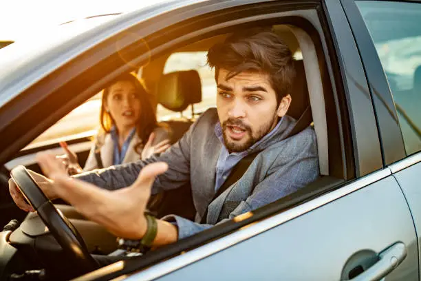 Photo of Nervous young man got stuck in traffic