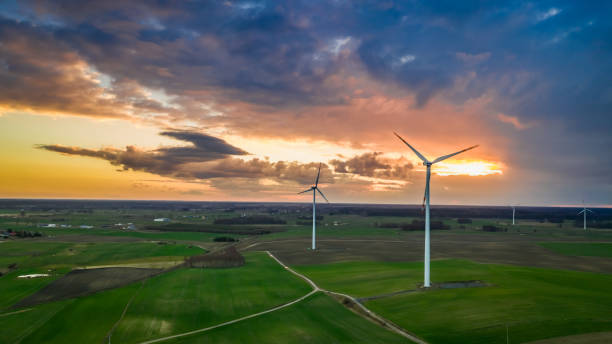 istock Flying above stunning wind turbines at sunset, Poland 1146975337