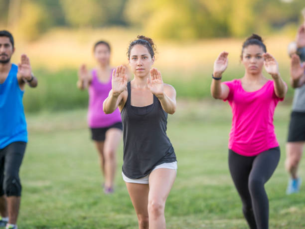 istock Stretching in the park with friends 1146977243
