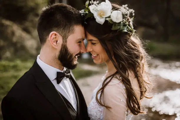 Photo of Bride and Groom enjoying in their love