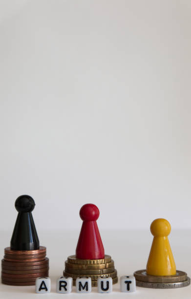 istock Coins stacks with figure yellow red black 1146978818