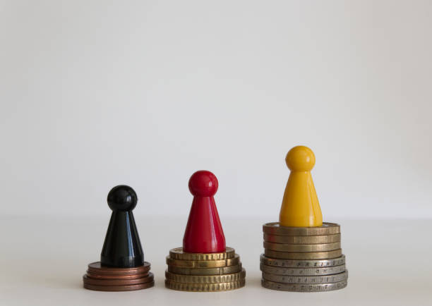 istock Coins stacks with figure yellow red black 1146978819