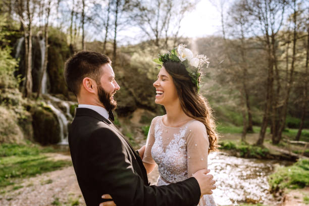 istock Newlyweds Celebrating Their Wedding Day In Rural Scenery 1146980465