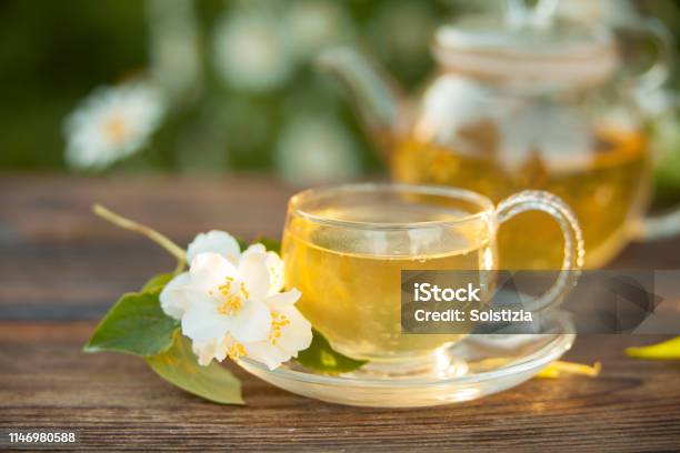Delicious Green Tea In Beautiful Glass Bowl On Table Stock Photo - Download Image Now