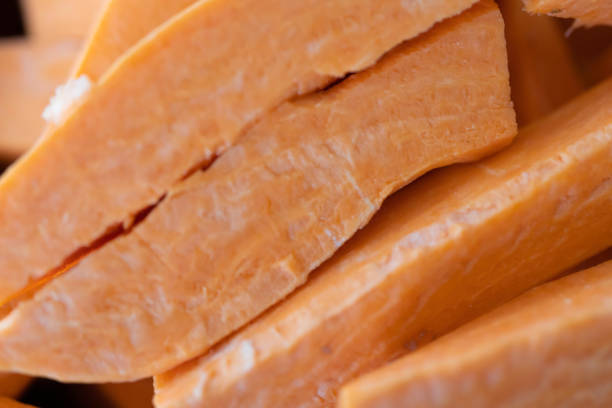 Slices of Raw Fresh Sweet Potatoes ready to cook