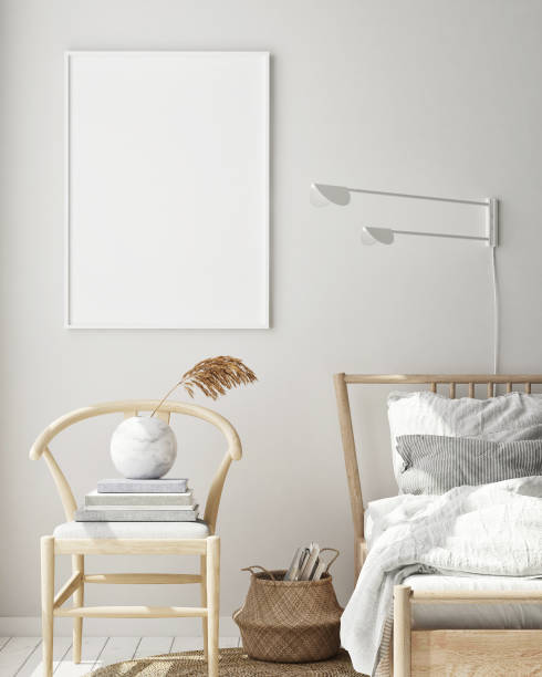 istock mock up poster frame in bedroom interior background, scandinavian style, 3D render 1146985862
