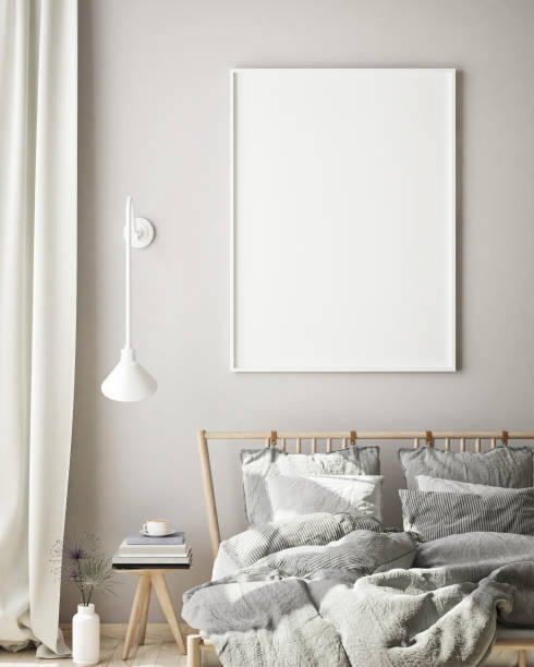 istock mock up poster frame in bedroom interior background, scandinavian style, 3D render 1146985917