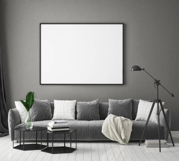 istock mock up poster frame in livingroom interior background, scandinavian style, 3D render 1146985924
