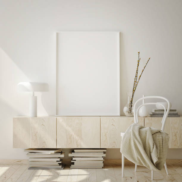 istock mock up poster frame in livingroom interior background, scandinavian style, 3D render 1146985939