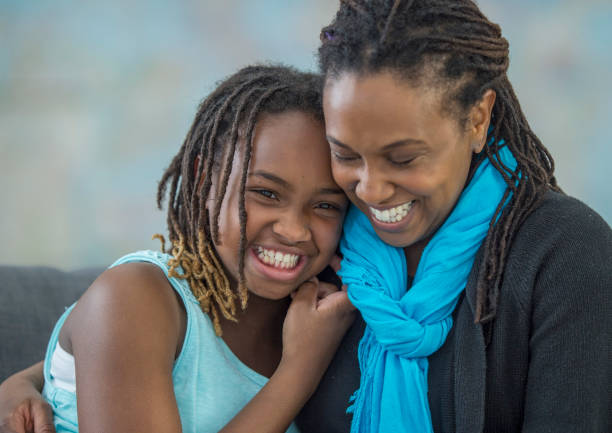 istock Mother and daughter hugging 1146986043