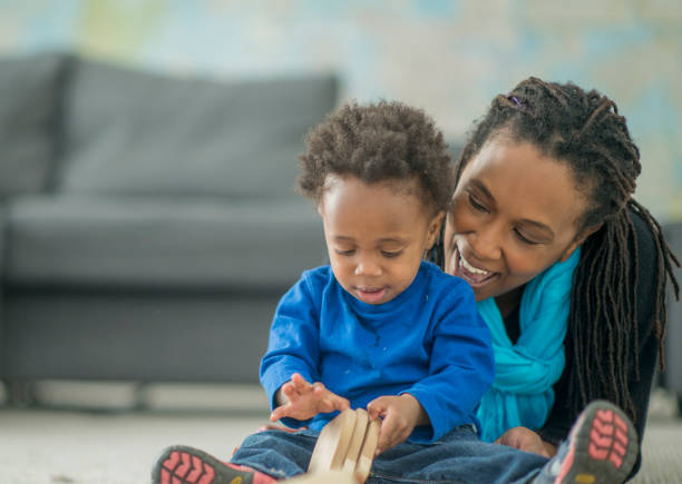 istock Single mother plays with her toddler 1146986060