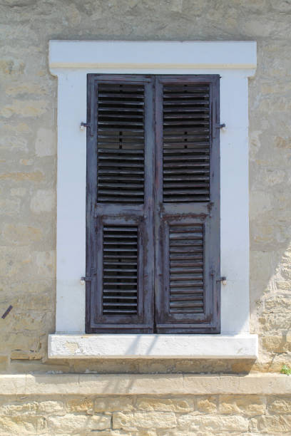 istock Window with old wooden shutters 1146986754