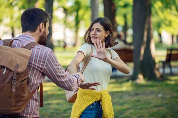 istock Young Couple is Arguing in the Park 1146989640