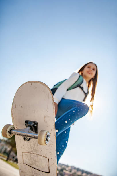 istock Skateboarding Young Girl 1146994533