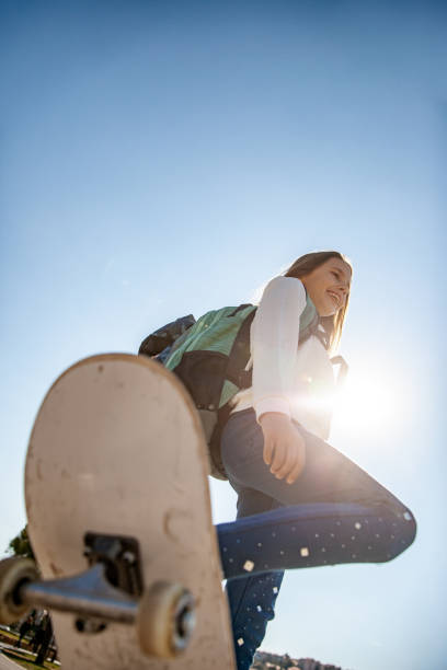 istock Smiling Young Girl With Skateboard 1146994535