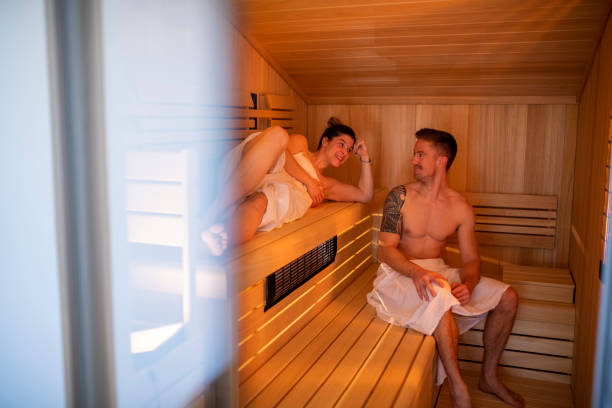 istock Man and woman in a sauna together 1146996272
