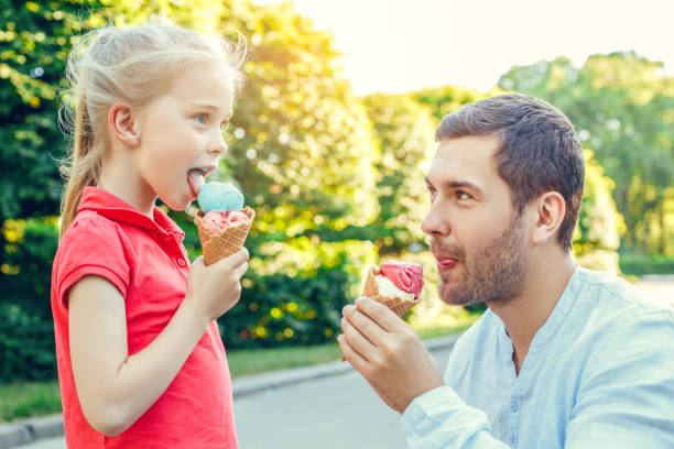 istock Father and daughter walk outdoors family time 1146997416