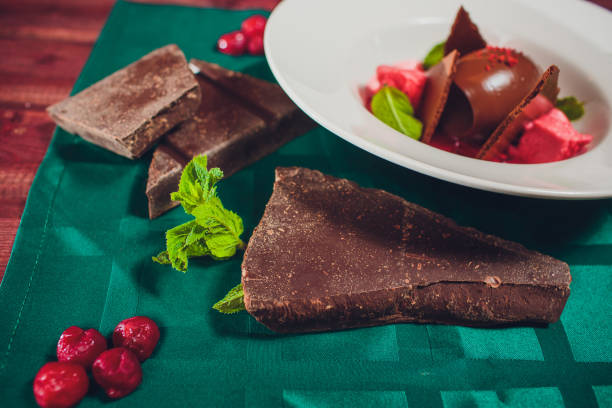 istock cheesecake brownies with cherry sauce, selective focus 1147000203