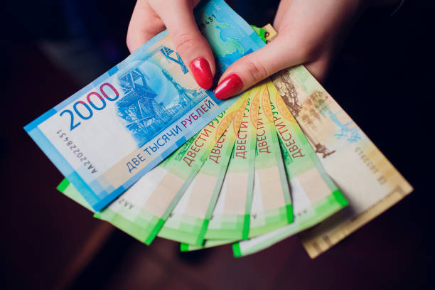 istock Russian roubles and some new 200 and 2000 roubles bills 1147000375