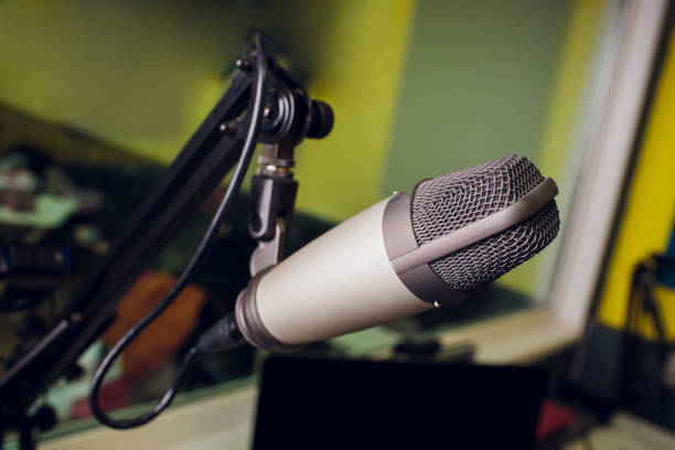 istock microphone on stand up comedy stage with reflectors ray, high contrast image 1147000440