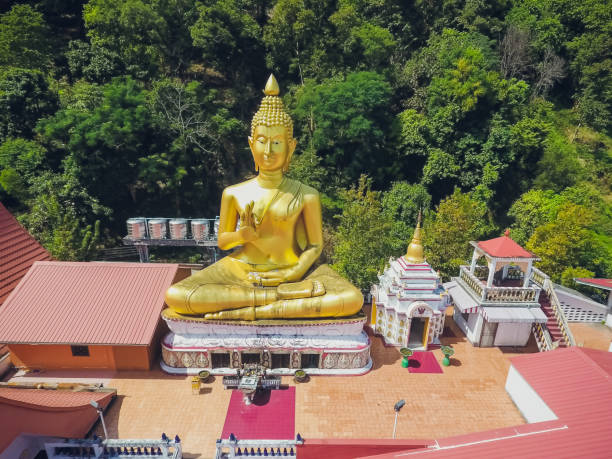 Golden statue sitting Buddha, Wat Khao Rang Samakkhitham, Phuket, Thailand