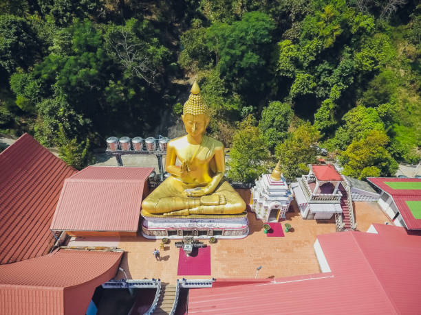 istock Golden statue sitting Buddha, Wat Khao Rang Samakkhitham, Phuket, Thailand 1147001209