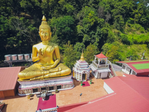 istock Golden statue sitting Buddha, Wat Khao Rang Samakkhitham, Phuket, Thailand 1147001221
