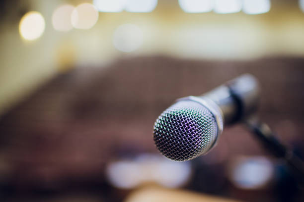 istock microphone on stand up comedy stage with reflectors ray, high contrast image 1147007686