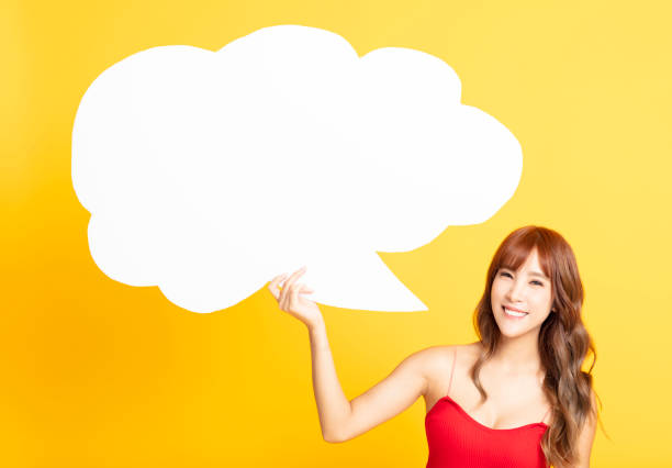 istock young woman with Speech Bubble Making an Announcement 1147010983